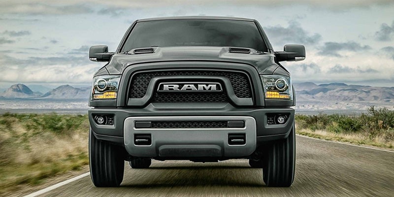 The front grille on the 2025 Ram 1500 in Starke, FL